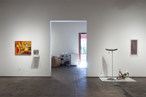 Installation photograph of JUXTAPOSED: The Art of Curation with works by Werner Drewes, Edgar Ewing, Nathan Huff and Ron Robertson